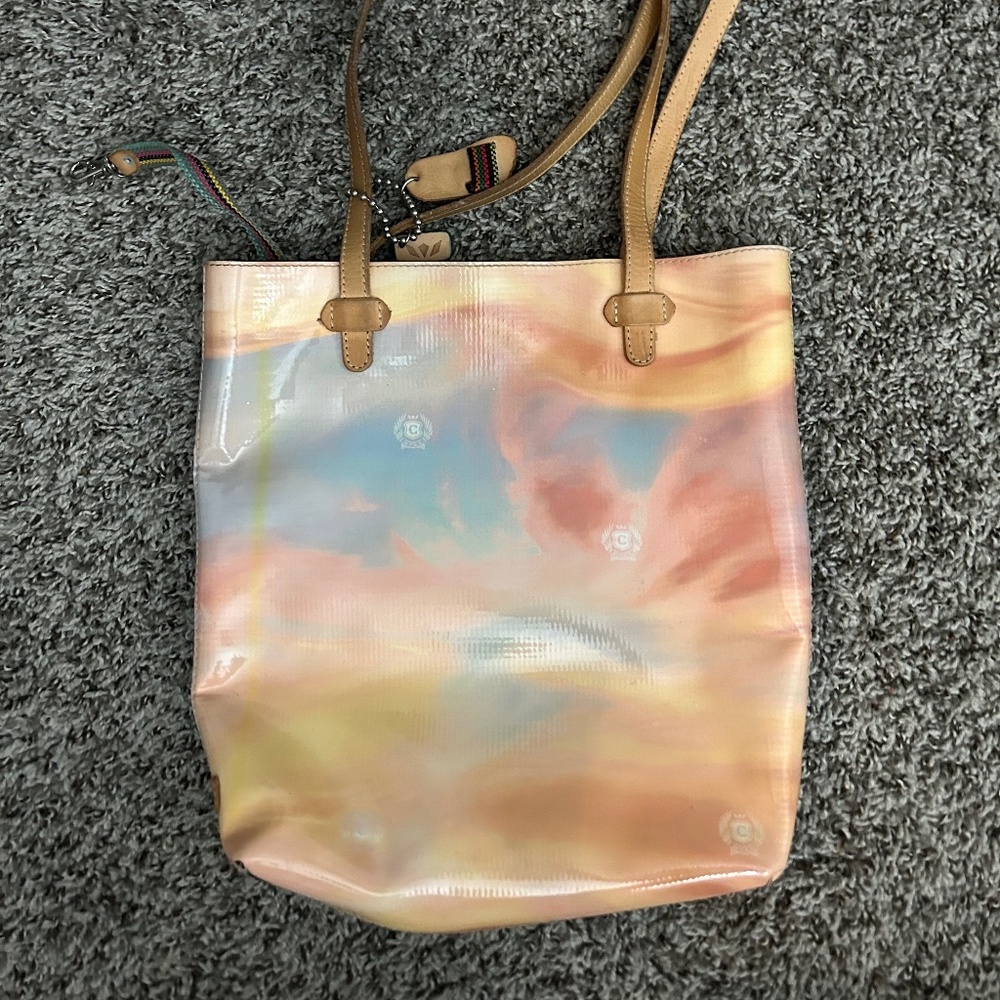 sky print consuela bag with tassel charm for sale